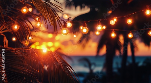 Warm Sunset Glow With String Lights Illuminating Tropical Palm Trees by the O...