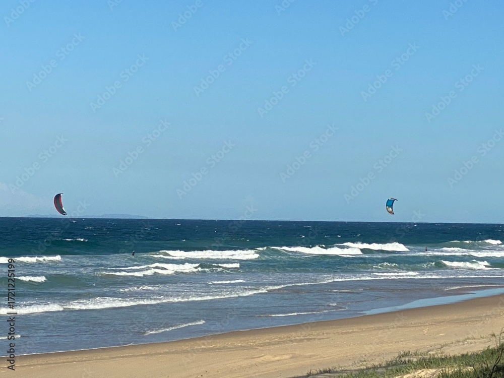 Obraz premium kite surfing on the beach