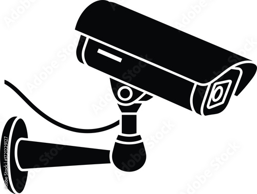 Black silhouette of a modern surveillance security camera mounted on a wall surveillance camera