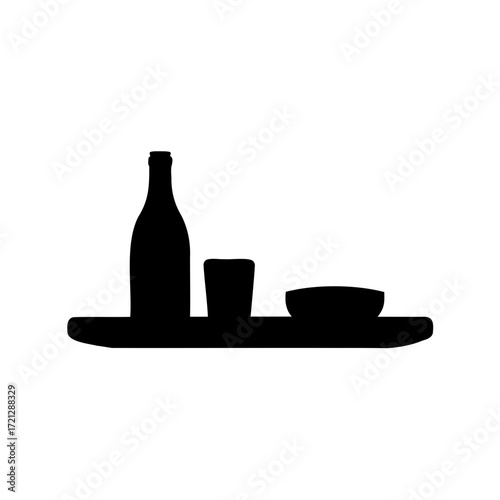 Silhouette of bottle, cup, and bowl on a tray against a white background