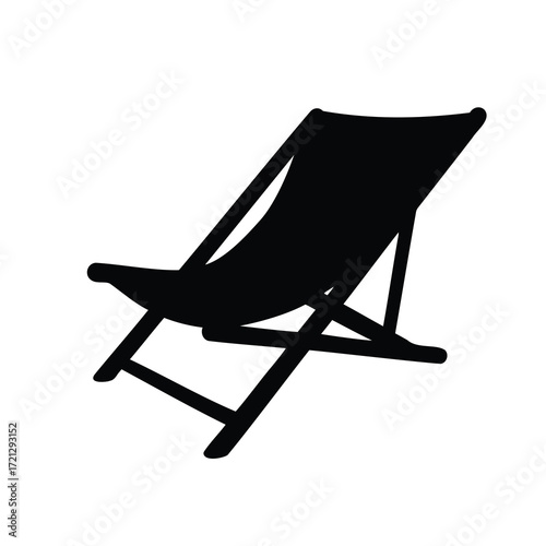 Silhouette of a beach chair suggests relaxation and a summer vacation atmosphere
