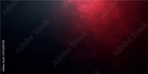 A stormy night sky with dark red clouds and rays of moonlight