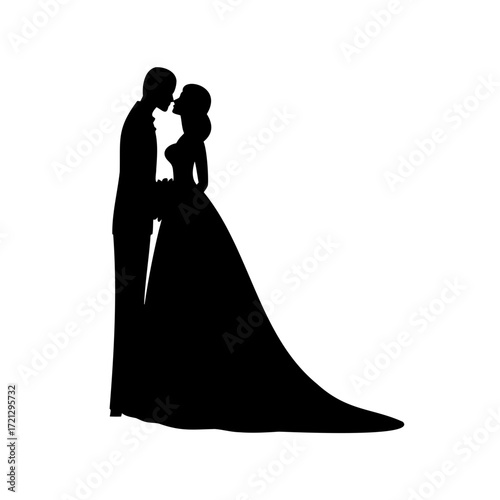 Romantic silhouette of a wedding couple sharing a kiss on their special day
