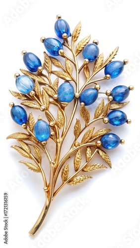 Wallpaper Mural A delicate golden brooch with blue gemstones arranged to resemble a sprig of fresh foliage Torontodigital.ca