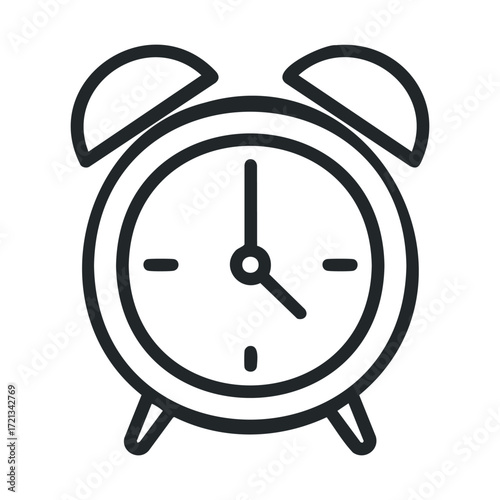 Classic round alarm clock showing time for morning routine