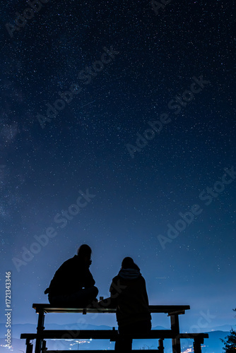 monument under the starry sky and milky way in night