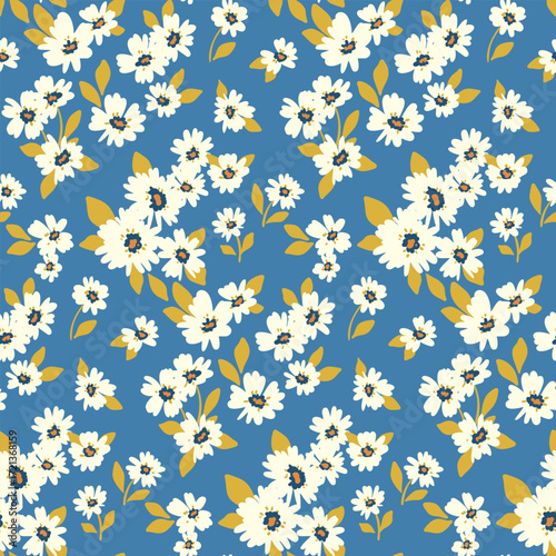 Seamless floral pattern, a ditsy liberty print with a simple cute retro motif. Graphic style botanical design of small hand-drawn white flowers and tiny leaves on a blue field. Vector illustration.