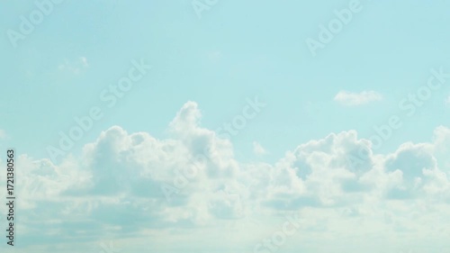 Cumulus White Clouds Soaring Transforming in Sunny Light Blue Sky Time Lapse. Good Weather, Sunny Day, Horizon. Clear Azure Sky and White Fluffy Flying Clouds Slow Motion, Blue Cloudy Skyscraper.