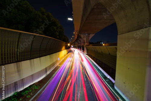 A night photography of traffic jam under the city overpass in Tokyo wide shot