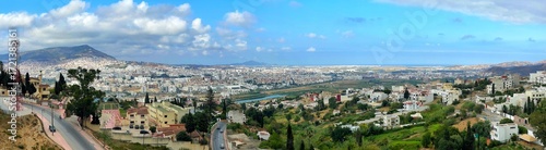 A panoramic view of the old city of Tangier with a view of link between the Mediterranean sea and the Atlantic sea and the port of tangier, morocco