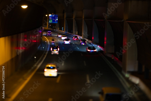A night photography of miniature traffic jam under the city overpass in Tokyo