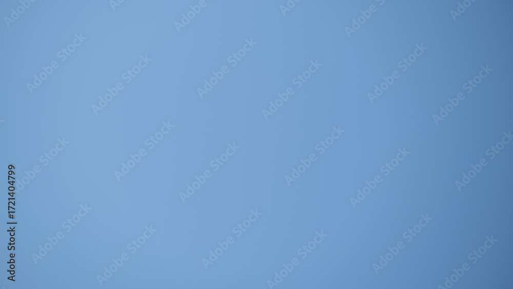 Obraz premium Minimalistic plain blue background with smooth surface