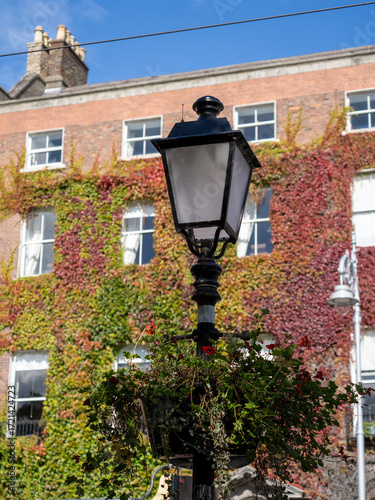Canvas Print Vintage street lamp on historic building facade Dublin Ireland