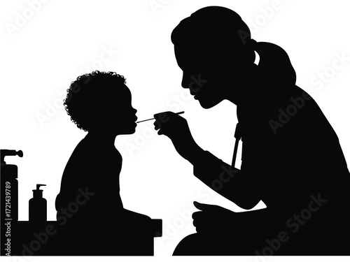 Doctor administering medicine to a young child silhouette