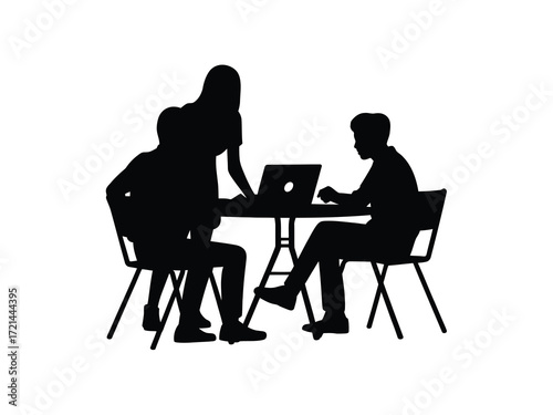 Silhouettes of people working together at a table with a laptop