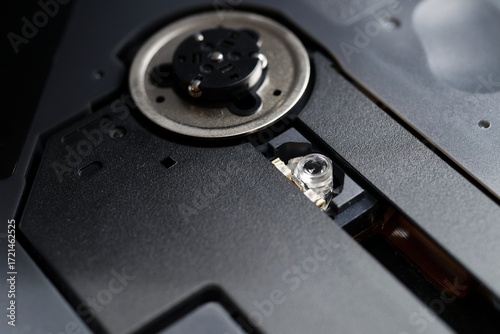 Wallpaper Mural Close-up of portable CD player laser lens and disc mechanism Torontodigital.ca