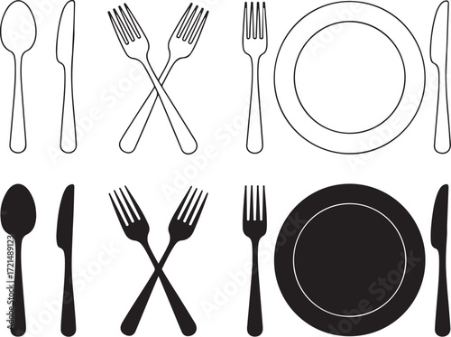 Set of silver cutlery with fork spoon and knife on white background