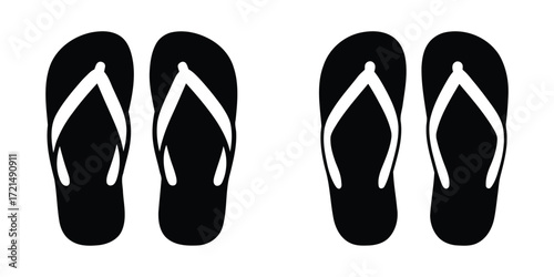 black flip flops on white background. black and white shoes