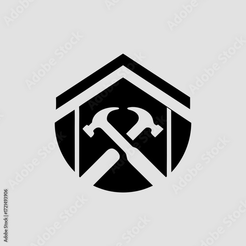 Hexagonal logo with house roof and crossed hammers on gray background Keywords: logo, hexagonal