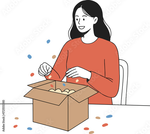 Woman smiling while unpacking colorful candies from a cardboard box