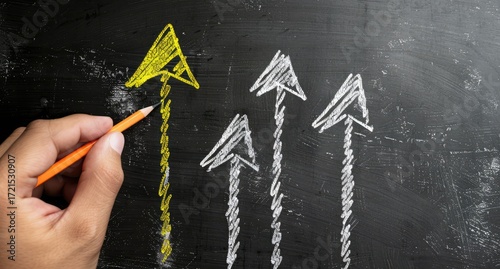 A hand draws a bright yellow arrow surpassing three other white arrows on a dark chalkboard background, symbolizing leadership and exceeding expectations