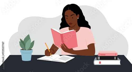 Young woman studying and writing in a book with plants and books on the desk
