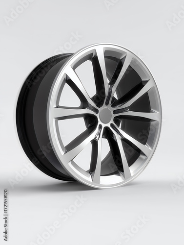 Modern Alloy Car Wheel Rim Isolated On Gray Background