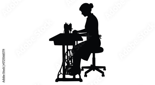 Silhouette of a woman seated and operating a vintage sewing machine