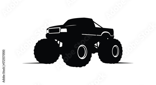 Black silhouette of a large monster truck with oversized tires