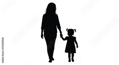 A mother and young child walking hand in hand silhouetted figure