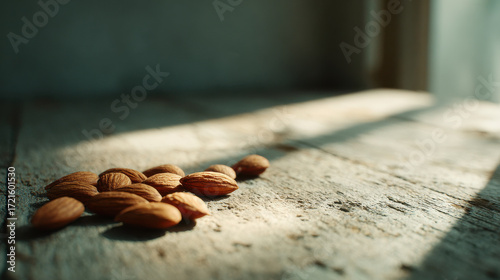Healthy almond snack diet for longevity on rustic wood table in warm morning light, organic nut food for wellness and calm mood