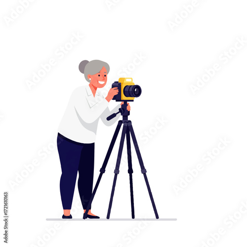 An elderly woman with grey hair is taking a photograph using a camera mounted on a black tripod.