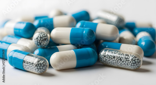Detailed shot of medical antibiotic capsules arranged on clean surface with realistic clarity