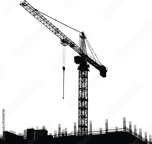 Towering construction crane silhouetted against bright sky over unfinished building framework
