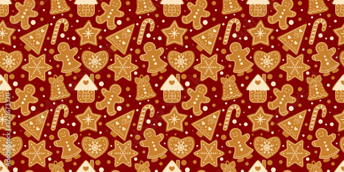 Seamless vector Christmas pattern with gingerbread cookies in the shape of stars, hearts, trees, bells, houses and gingerbread men on a red editable background
