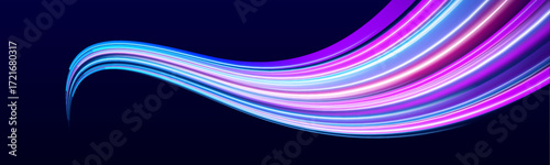 Electric blue and hot pink light streaks race across a digital highway. The scene glows with speed and intensity. Futuristic motion captured in glowing trails.