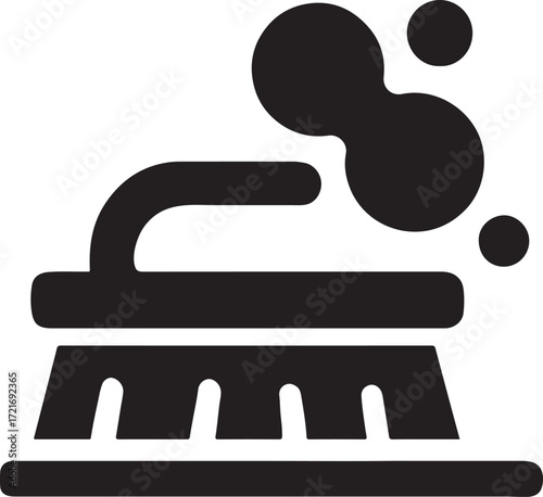 Silhouette brush with foam glyph icon representing cleaning, hygiene, and maintenance.