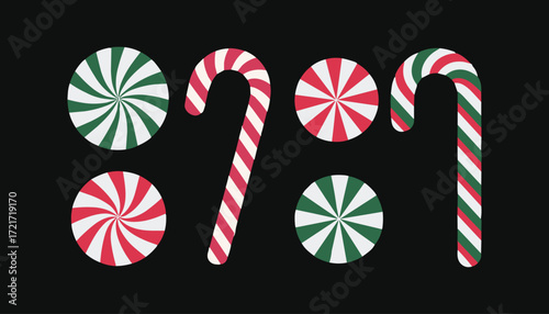 Red green and white striped candy canes and round candies peppermint sweet