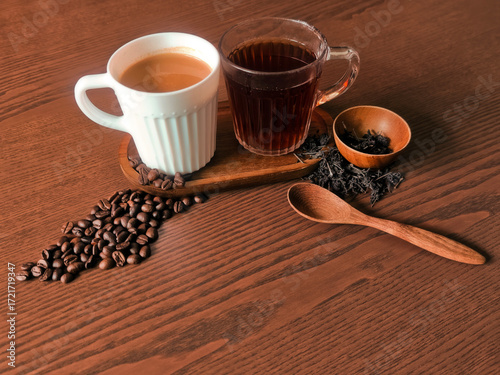 Hot coffee and hot tea on a wooden table