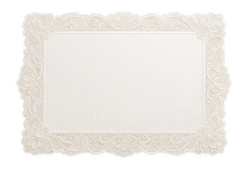 White placemat with ornate lace border.
