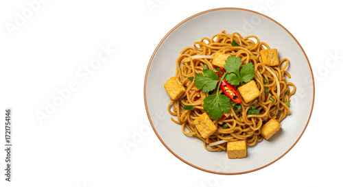 Plate of stir-fried noodles with tofu, chili, and fresh herbs on white background, healthy Asian vegetarian meal, perfect for dinner recipes