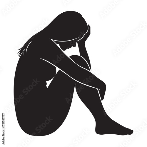 Silhouette of Sad Girl Sitting Alone