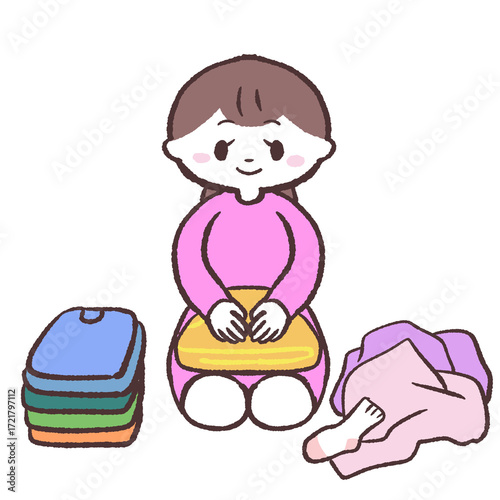 服をたたむ女性のイラスト