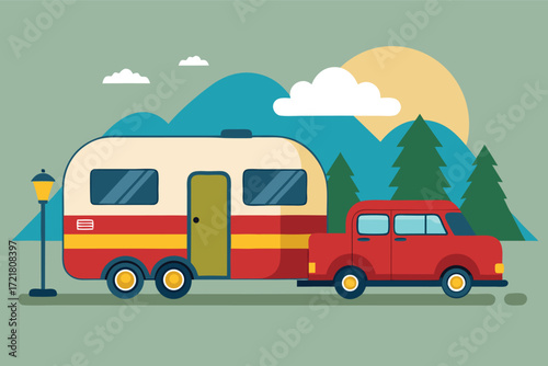 Retro camper and red truck parked in a serene mountain landscape during sunset