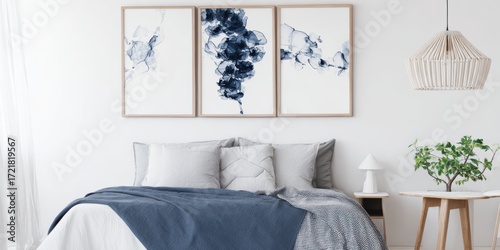 Contemporary bedroom with blue bedding abstract art and pendant light interior minimalist