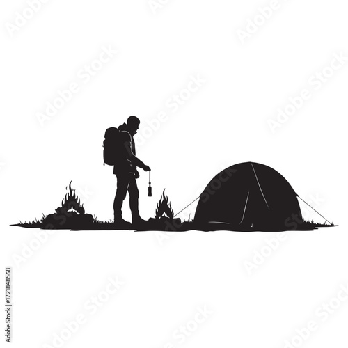 Silhouette of hiker by campfire and tent at dusk camping