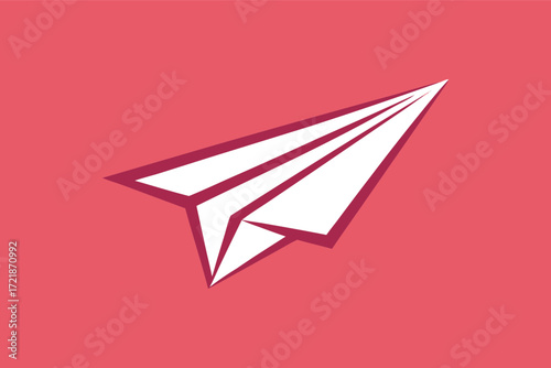 Creative paper airplane design on a bold red background showcases simplicity and imagination in flight