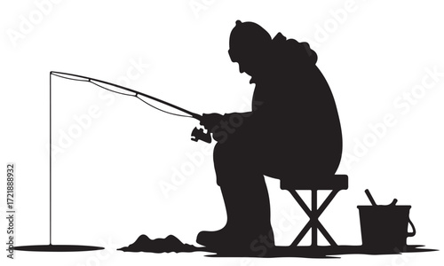 Silhouette of a Person Ice Fishing