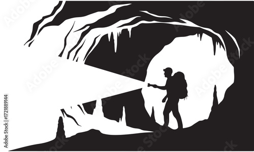 Person Exploring a Cave with a Flashlight