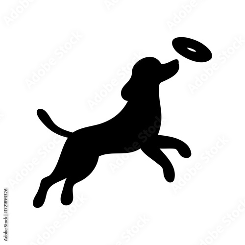 Black silhouette of a dog leaping to catch a disc, isolated on white